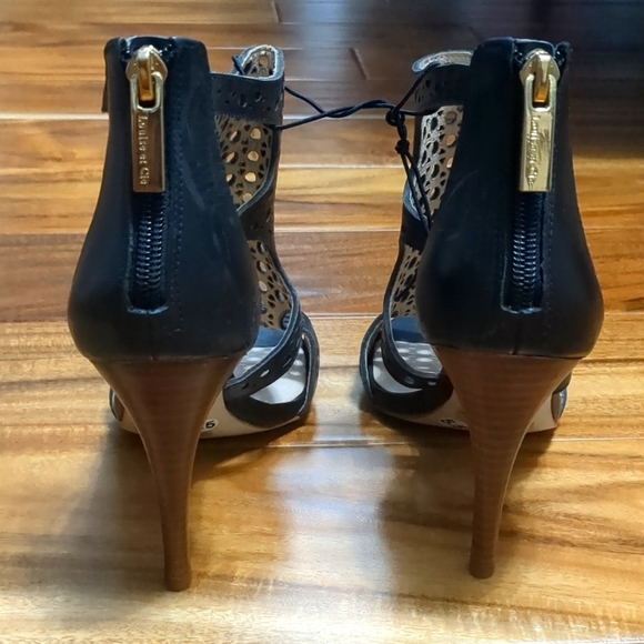 New size 5.5 heels. Black with a brown heel. - Picture 3 of 5